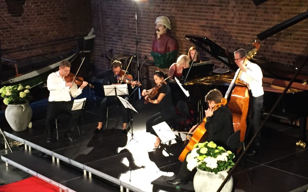 A photo from Sunday's concert at the 2019 Kon-Tiki Chamber Music Festival, Gershwin's "Rhapsody in Blue" arranged for piano solo (Elizabeth Pridgen) and string quintet. (credit: Ingrid Hillestad)